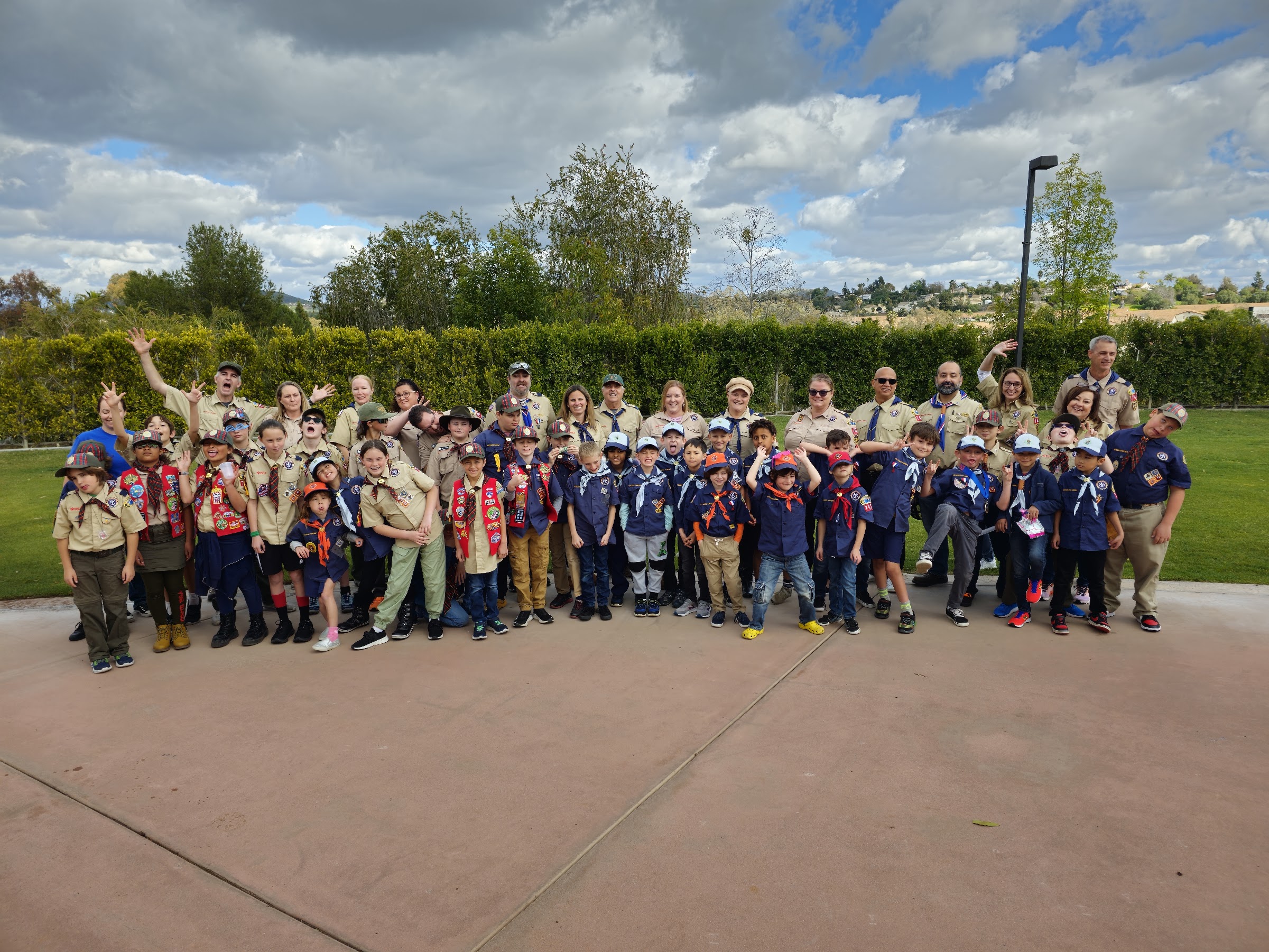 Local Cub Scouts, Scouts, and adult leaders gathered together