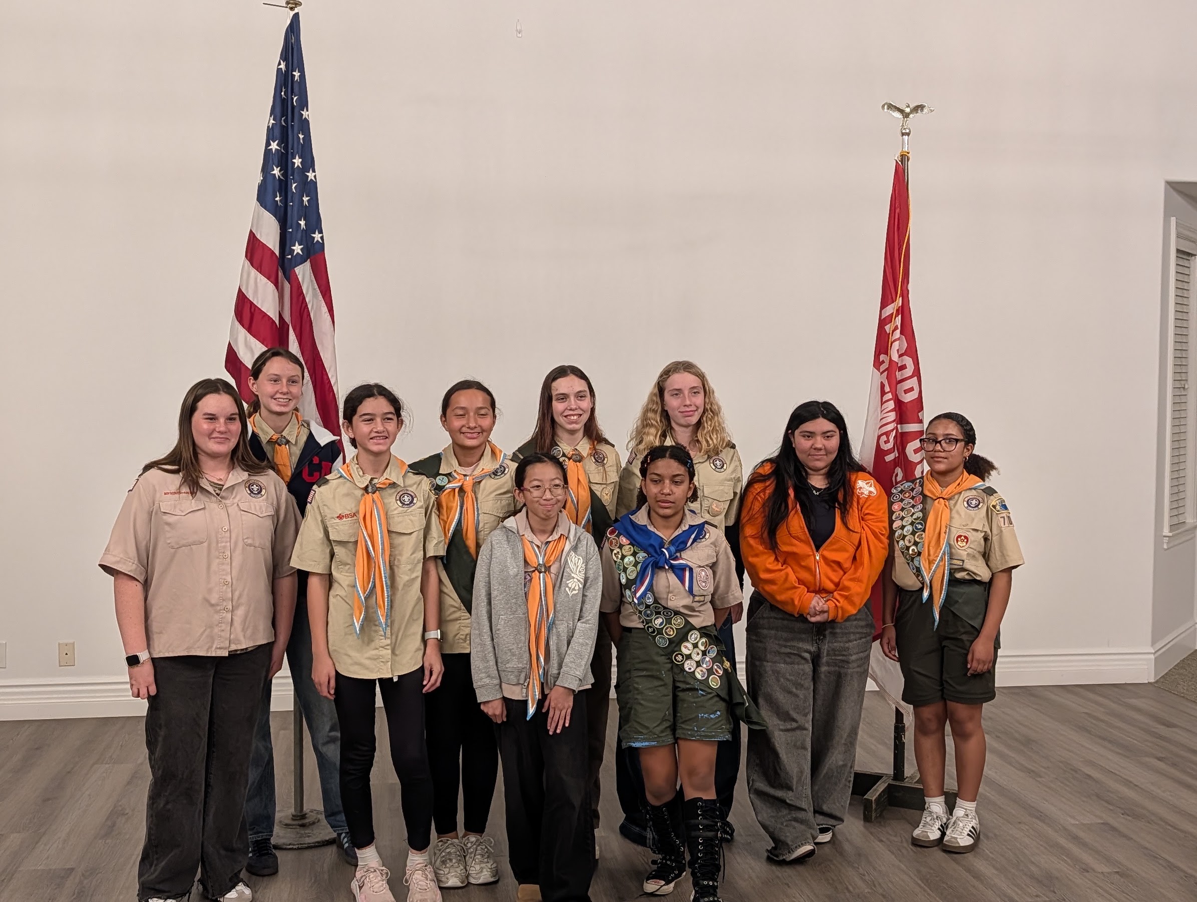 Members of Scouting America Troop 700G gathered at the club